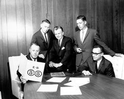 Exchange Bank employees with 5 for 5 brochure, Santa Rosa, California, 1964