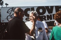 Gene Benedetti talking to an unidentified man at Clover Stornetta's open house, held at the Clover Stornetta plant, 91 Lakeville Street, Petaluma, California, September 28, 1991