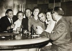 Jack and Mary Dei seated at a bar with others in Tijuana, Mexico, November 15, 1962