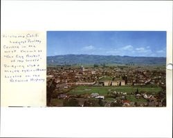 Color postcard view of Petaluma, California taken from the hills located behind Petaluma High School looking east, about 1950