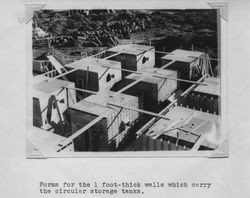Forms for the 1 foot thick walls that contain the circular storage tanks at the Poultry Producers of Central California mill in Petaluma, about 1937