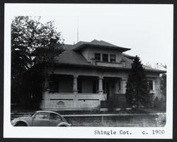 Hip roof shingle cottage