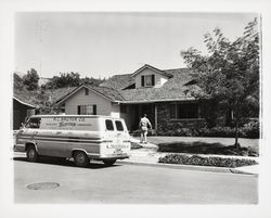 Bruner Company truck parked in front of a house, Santa Rosa, California, 1964
