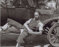 Burgess Blanchard Titus leaning on a Ford Model A, Sonoma County, California, 1924