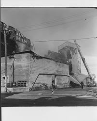 View of the dismantling of the Golden Eagle Milling Company warehouse, Petaluma, California, 1965