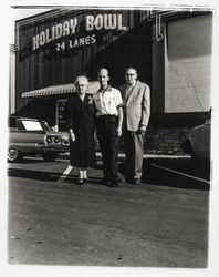 Melvin S. and Flora Ann Cobb with an unidentified man in front of Holiday Bowl, Santa Rosa, California, 1959