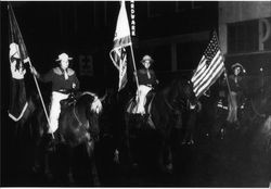 Color guard of the California Centaurs mounted junior drill team in the 1946 Rose Parade, Santa Rosa, California