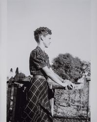 Cathleen J. Volkerts at the garden gate, Petaluma, California, September 1938