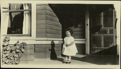 Marjorie Carpenter on the porch of her family's house in Petaluma, California in 1918