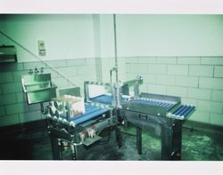 40 pound cheese block cutting machine at the California Cooperative Creamery on Western Avenue, Petaluma, California