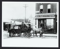 Lee Brothers and Company dray wagon in front of the office on Hinton Avenue