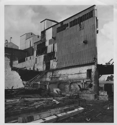 Views of the dismantling of the Golden Eagle Milling Company warehouse, Petaluma, California, 1965