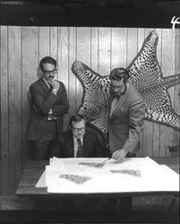 Bill Smith, Richard B. Codding and Hugh Codding looking at building plans in office of Codding Enterprises, Santa Rosa, California, May 26, 1971