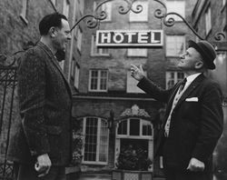 John King and Augie Lepori at the Hotel Petaluma entrance, Petaluma , California, about 1936