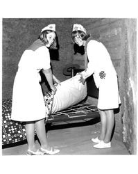 Cinnabar and Rolling Hills 4-H members making beds at the Old Adobe Fiesta, Petaluma, California, 1967