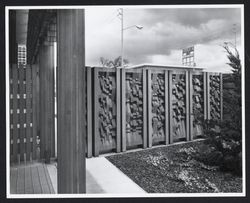 Library's redwood fence designed by Stefan A. Novak