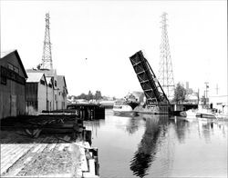 Boat Harbor King under the D Street drawbridge, Petaluma, California, 1961