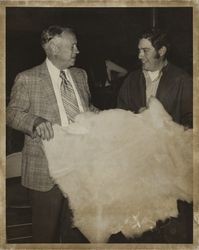 Wes Jamison presenting sheepskin to Don Silacci, the Judge Along winner, at the Sonoma County Fair, Santa Rosa, California