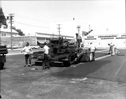 Paving the parking lot on the 100 block of Keller Street, Petaluma, California, 1950