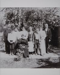 Sister and nieces of Montgomery Paxton Akers, with their husbands, pose in the yard of the Akers home, Schellville, about 1900