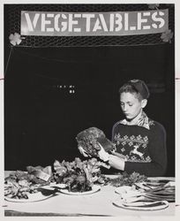 Ronald Feige, vegetable exhibitor at the Sonoma County Fair, Santa Rosa, California, July 15, 1956