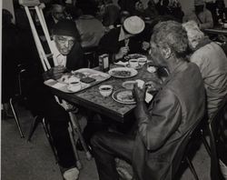 Dining guests at St. Anthony's Dining Room, 121 Golden Gate Avenue, San Francisco, California, about 1979