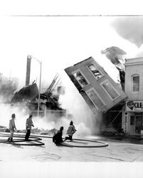 Walls falling from the Continental Hotel fire