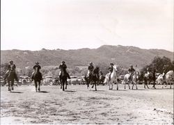 Members of the California Centaurs mounted junior drill team at the Boyes Hot Springs Horse Show in 1946 with Hogback Mountain in the background