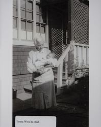 Emma E. Wood holds a baby in Petaluma, California, photographed between 1935 and 1940