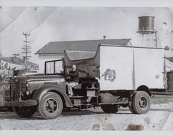 Louis R. Sturla on a garbage truck, Petaluma, California, in the 1940s