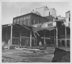Views of the dismantling of the Golden Eagle Milling Company warehouse, Petaluma, California, 1965