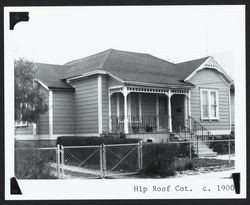 Workers cottage with hip roof and gables