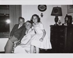 Janet McGregor poses for a photograph with her grandchildren, Bill and Bonnie Alwes, at Dagny Juell's house on Easter, Santa Rosa, California, about 1956