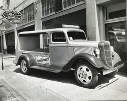 Petaluma Cooperative Creamery delivery truck parked in front of Sanderson Ford dealership, about 1939