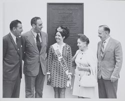 Dairy Princess Vickie Mulos with fair officials Bob Dupret, Ig Vella, and two unidentified individuals, the Sonoma County Fair, Santa Rosa, California