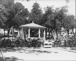 Speakers in the bandstand at an unidentified ceremony in Walnut Park, Petaluma, California, about 1952