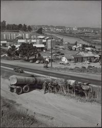 Overturned tanker truck near Shell Oil facility on Petaluma Boulevard South, 1497 Petaluma Boulevard South, Petaluma, California, 1955