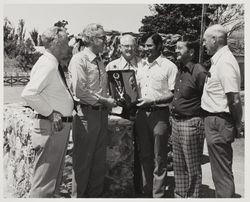Tom Nunes accepts 1975 Dairy of the Year award from fair officials at the Sonoma County Fair, Santa Rosa, California