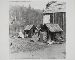 Bagley children with their playhouses