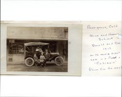 Schieck family with their first car parked on Main Street, Penngrove, California
