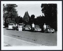 Fleet of Volkswagen vans and cars belonging to Penn Roofing and Siding Co., Sebastopol, California, 1962