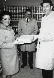 Jack and Mary Dei with an unidentified man standing in an unidentified Cleveland, Ohio store, February 1978