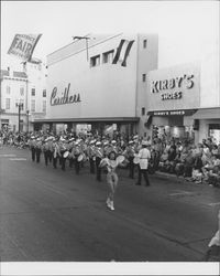 Majorette and the Santa Rosa Legionnaires Band in the Sonoma-Marin Fourth Agricultural District Fair Parade, Petaluma, California, , July 1955