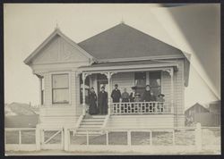 Sarah and Edgar Raymond standing with their family on the porch of their house at 314 Seventh Street, Petaluma, California, 1905