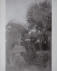 Montgomery Paxton Akers stands with an unidentified man in the yard of his ranch in Schellville, California, 1880s