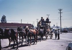 Team of six horses pulling a stagecoach