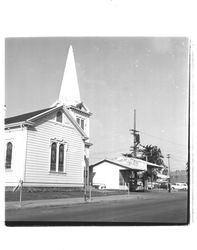 First Presbyterian Church and Carl's Radiator Shop, Petaluma, California, 1951