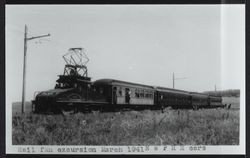 Petaluma and Santa Rosa Railroad Company freight motor number 506 pulling four Northwestern Pacific cars on a railfan special