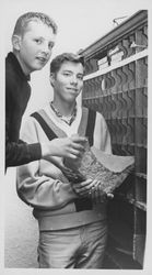 Boys demonstrating a new cupboard for the museum, Petaluma, California, about 1966