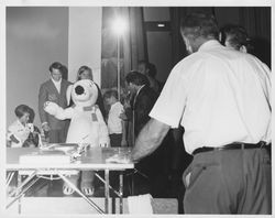 Snoopy attending the wrist wrestling competition in Petaluma, California, 1963